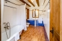 Baño en suite con bañera antigua